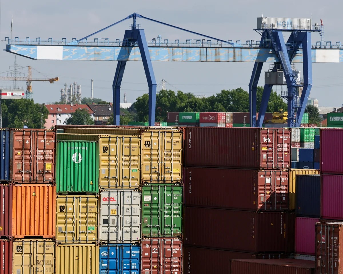 Asian stocks slide as Trump hits more than 80 countries with new tariffs – business live