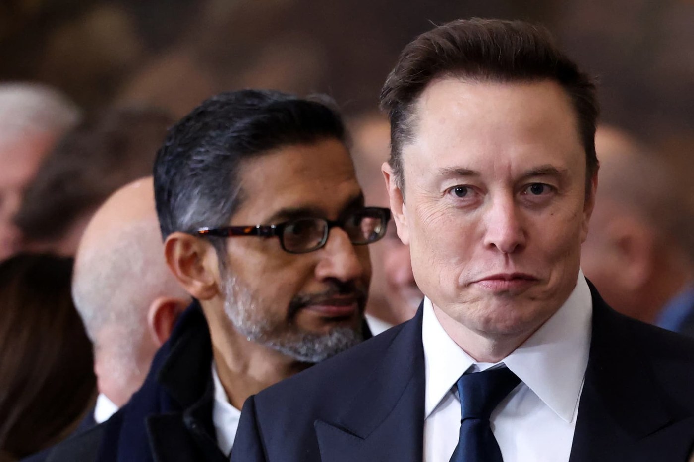 Tesla falls 13%, Alphabet sinks 7% as AI spending concerns spook investors