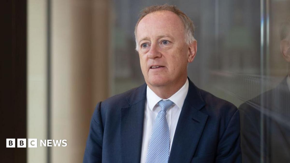 Former Lloyd's of London boss's relationship breached rules, firm says