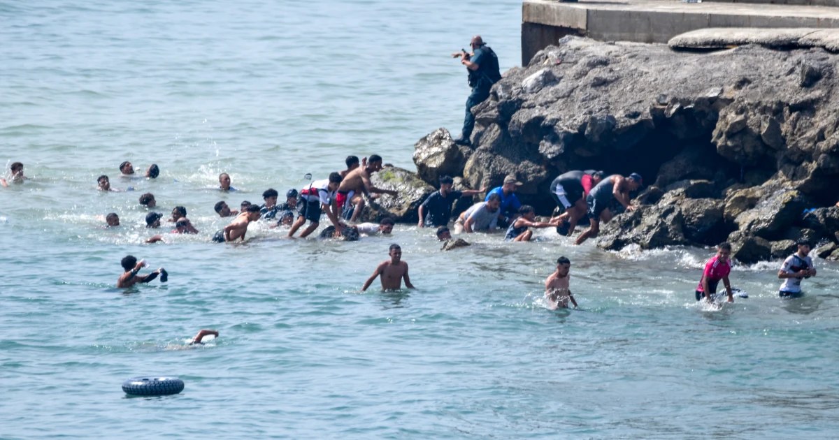 Migrants pour into Spain’s Ceuta from Morocco, military called in