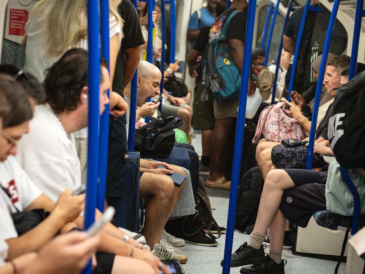 ‘Like a sauna’: London tube travellers swelter in temperatures higher than legal limit for cattle