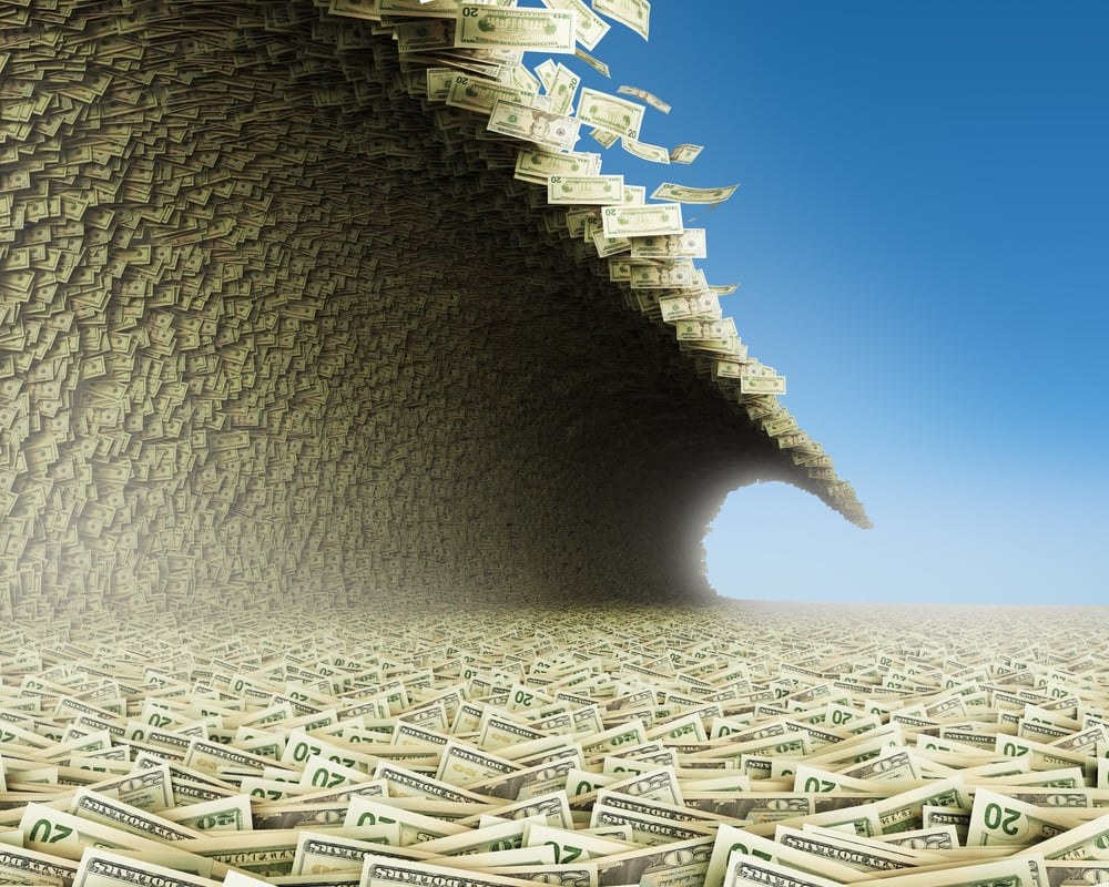 Amazon, Alphabet Lead 'AI Debt Tsunami' Now Blamed for 20-Year-High Rates - Benzinga