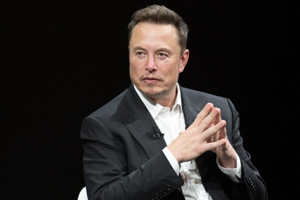 Elon Musk Says AI Is A 'Supersonic Tsunami.' Wall Street Questions AI Spending - Tesla (NASDAQ:TSLA), Pal - Benzinga
